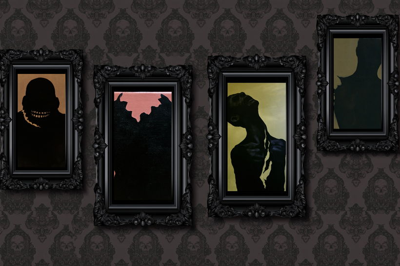 Four silhouette portrait prints in ornate black frames on patterned wallpaper