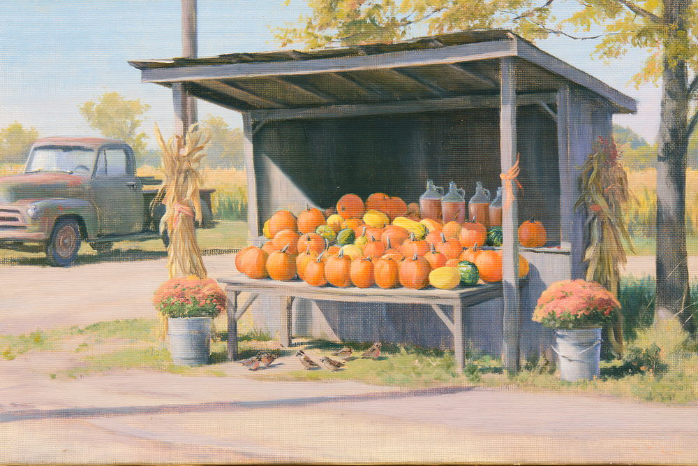 A roadside stand piled with pumpkins and jugs of cider